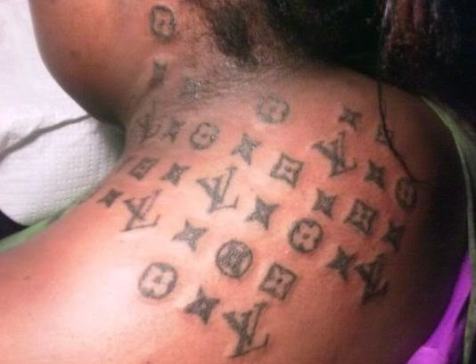 Louis Vuitton tattoo located on the neck.
