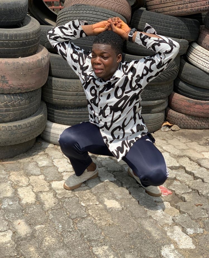 Zikoko's guide, man squatting