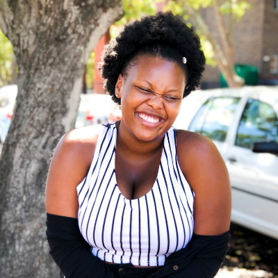 Woman smiling on the street